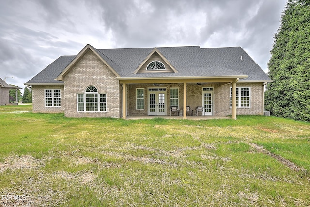 302 Charlton Ct, Bluff City, TN 37618 - rear view of property with french doors, brick siding, ceiling fan, a patio area, and a lawn