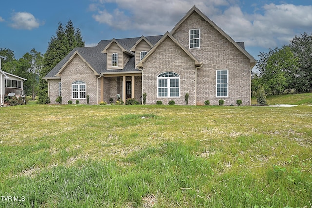 302 Charlton Ct, Bluff City, TN 37618 - view of front of house featuring brick siding and a front yard