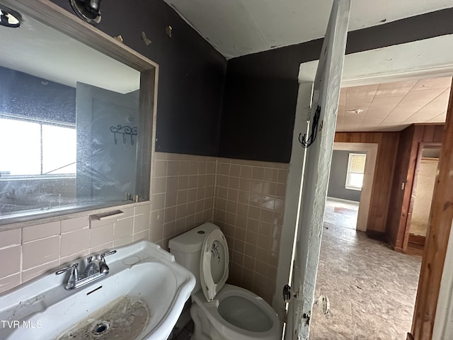 276 Spurgeon Ln, Bristol, VA 24201 - bathroom featuring tile walls, a sink, and toilet