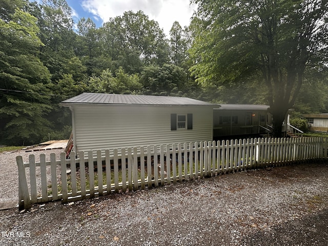 11510 Dogwood Ln, Pound, VA 24279 - view of property exterior with a fenced front yard and metal roof