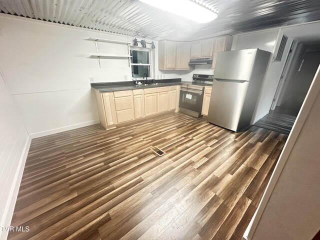 11510 Dogwood Ln, Pound, VA 24279 - kitchen featuring stainless steel appliances, under cabinet range hood, open shelves, dark countertops, and a sink