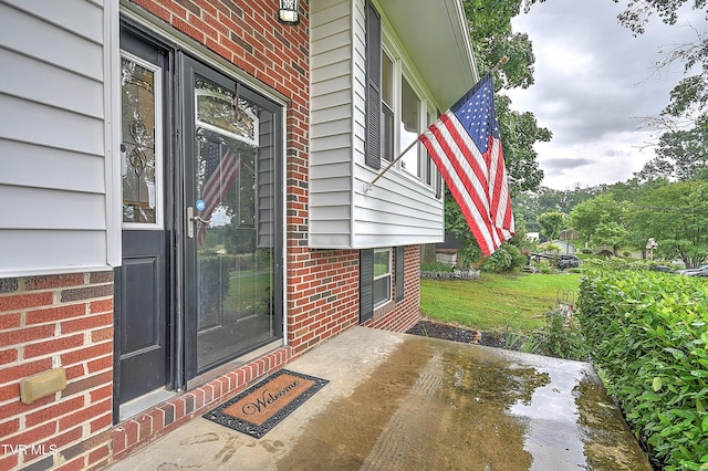 118 Greenmeadow Ln, Jonesborough, TN 37659 - doorway to property featuring brick siding and a patio