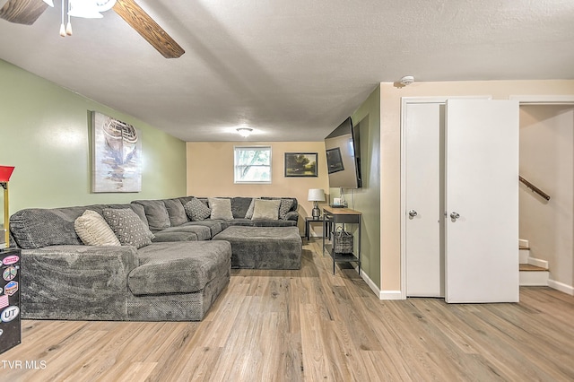 118 Greenmeadow Ln, Jonesborough, TN 37659 - living room with wood finished floors, stairs, ceiling fan, and baseboards