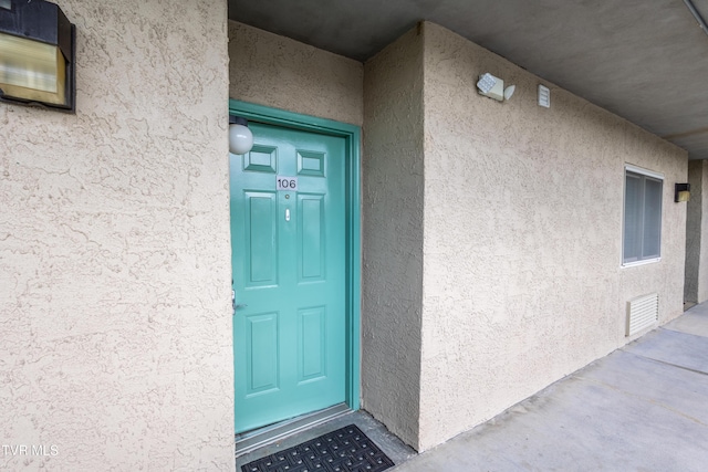 3215 N River Rd Unit 106, Pigeon Forge, TN 37863 - view of exterior entry featuring stucco siding
