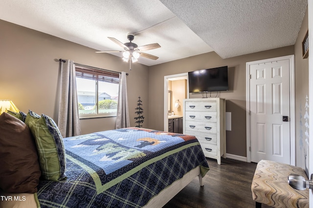 3215 N River Rd Unit 106, Pigeon Forge, TN 37863 - bedroom featuring a textured ceiling, dark wood-style floors, baseboards, and a ceiling fan