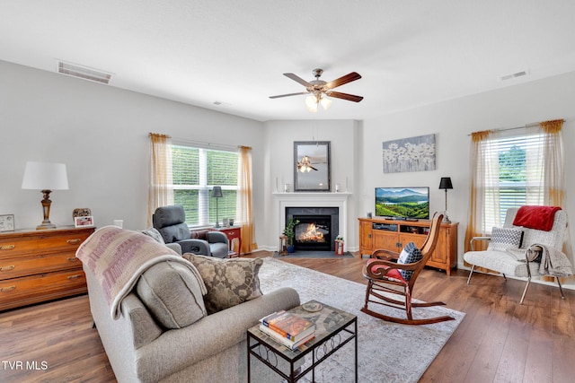 936 Pampas Dr, Jonesborough, TN 37659 - living area featuring a ceiling fan, a fireplace with flush hearth, and wood finished floors