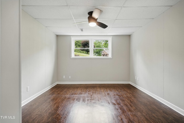 5530 Paramont Rd, Wise, VA 24293 - empty room with a drop ceiling, wood finished floors, ceiling fan, and baseboards