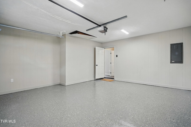 5530 Paramont Rd, Wise, VA 24293 - garage featuring electric panel, a garage door opener, and baseboards