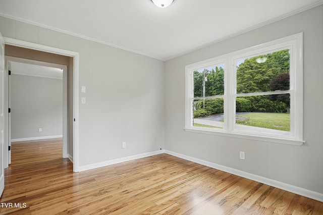 5530 Paramont Rd, Wise, VA 24293 - unfurnished room with ornamental molding, baseboards, plenty of natural light, and light wood finished floors