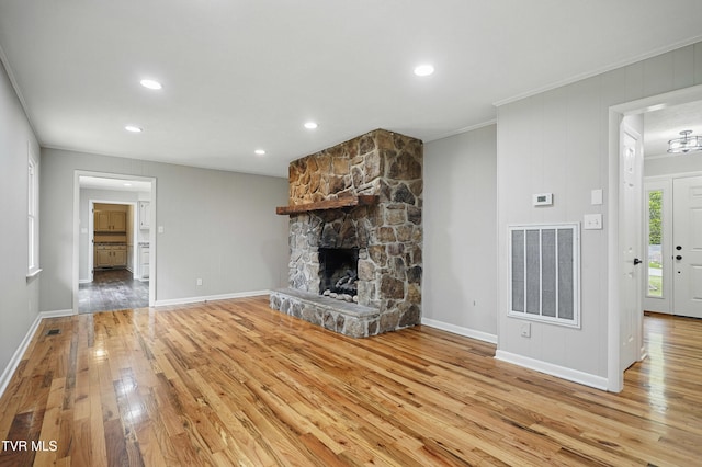 5530 Paramont Rd, Wise, VA 24293 - unfurnished living room with light wood-style floors, baseboards, a fireplace, ornamental molding, and recessed lighting