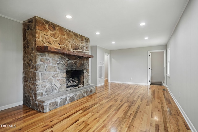 5530 Paramont Rd, Wise, VA 24293 - unfurnished living room with wood finished floors, a stone fireplace, baseboards, and recessed lighting