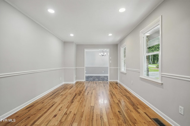 5530 Paramont Rd, Wise, VA 24293 - empty room with a chandelier, light wood-style floors, baseboards, and recessed lighting