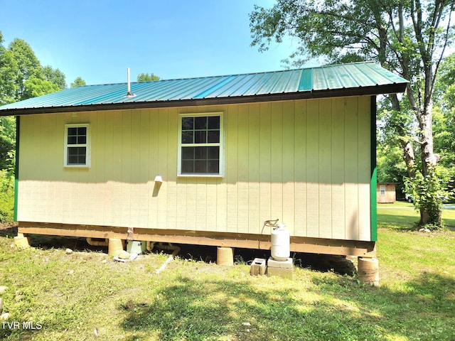 2428 Middle Creek Rd, Afton, TN 37616 - view of property exterior with a yard and metal roof