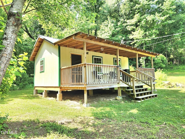 2428 Middle Creek Rd, Afton, TN 37616 - view of front of house featuring a deck and a front yard