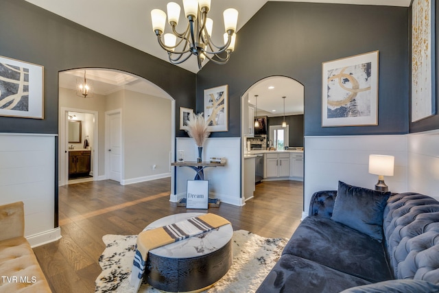 1132 Panoramic Vis, Gray, TN 37615 - living area with arched walkways, a high ceiling, wood finished floors, a chandelier, and crown molding