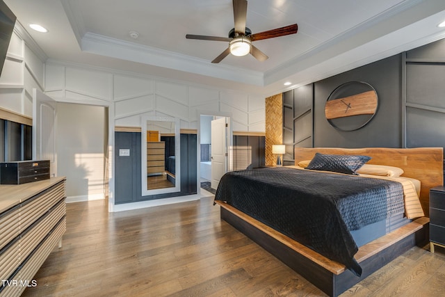 1132 Panoramic Vis, Gray, TN 37615 - bedroom with a tray ceiling, crown molding, wood finished floors, a decorative wall, and recessed lighting