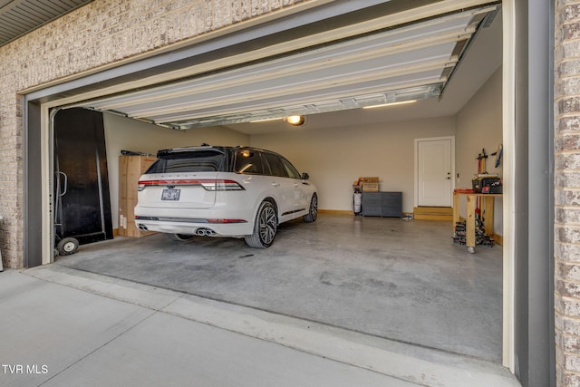 1132 Panoramic Vis, Gray, TN 37615 - garage with concrete driveway and a garage door opener