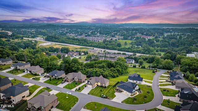 1132 Panoramic Vis, Gray, TN 37615 - aerial view at dusk of a residential view and view of wooded area