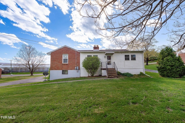 173 Keller Ln, Marion, VA 24354 - manufactured / mobile home with a front lawn and a chimney
