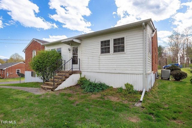 173 Keller Ln, Marion, VA 24354 - view of front of property with a front yard and central air condition unit