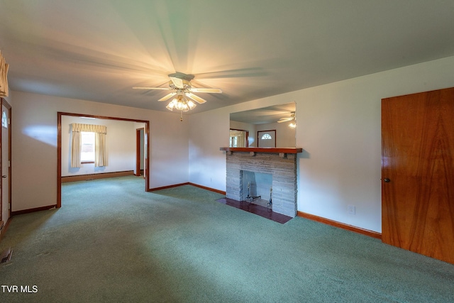 173 Keller Ln, Marion, VA 24354 - unfurnished living room with a ceiling fan, carpet floors, baseboards, and a fireplace