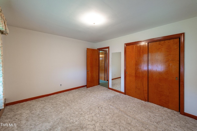 173 Keller Ln, Marion, VA 24354 - unfurnished bedroom with a closet, baseboards, and carpet flooring