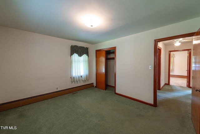 173 Keller Ln, Marion, VA 24354 - unfurnished bedroom with carpet floors, baseboards, a closet, and a baseboard radiator