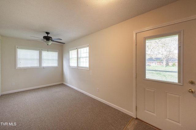 173 Keller Ln, Marion, VA 24354 - carpeted foyer featuring ceiling fan, baseboards, and a textured ceiling