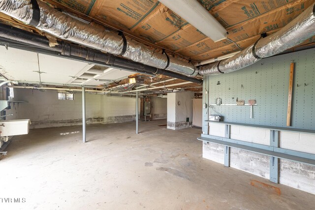 173 Keller Ln, Marion, VA 24354 - unfinished basement with water heater and a sink