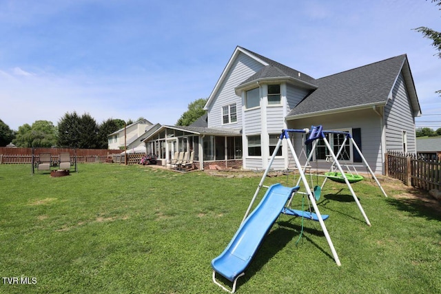 21164 Vances Mill Rd, Abingdon, VA 24211 - rear view of house with a sunroom, a playground, and roof with shingles