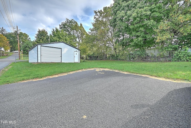 218 W Banner St, Lebanon, VA 24266 - garage featuring view of scattered trees