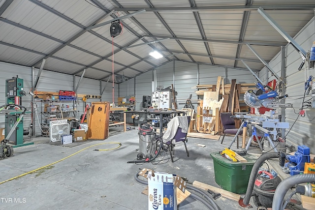 218 W Banner St, Lebanon, VA 24266 - garage featuring metal wall and a workshop area