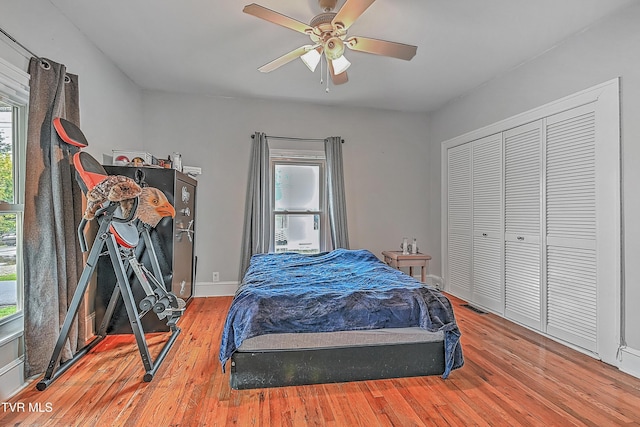 218 W Banner St, Lebanon, VA 24266 - bedroom with wood finished floors, a ceiling fan, baseboards, and a closet