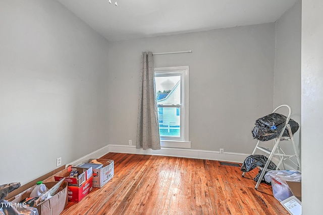 218 W Banner St, Lebanon, VA 24266 - misc room featuring hardwood / wood-style floors and baseboards