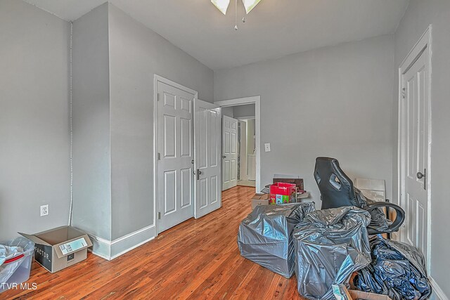 218 W Banner St, Lebanon, VA 24266 - bedroom with wood finished floors and baseboards