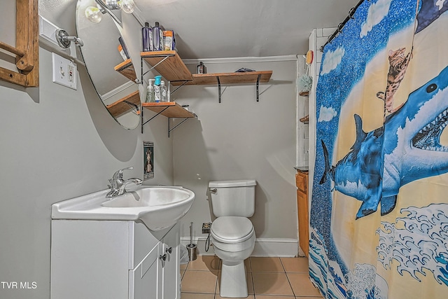 218 W Banner St, Lebanon, VA 24266 - full bathroom featuring vanity, tile patterned flooring, toilet, and baseboards