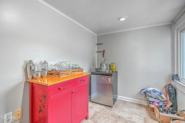 218 W Banner St, Lebanon, VA 24266 - kitchen with fridge, red cabinetry, crown molding, baseboards, and butcher block counters