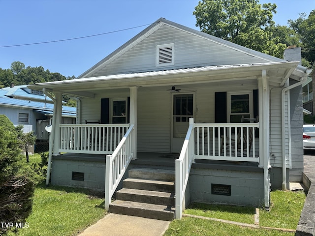 181 Powerhouse Holw, Clintwood, VA 24228 - view of front facade with covered porch, a chimney, and crawl space