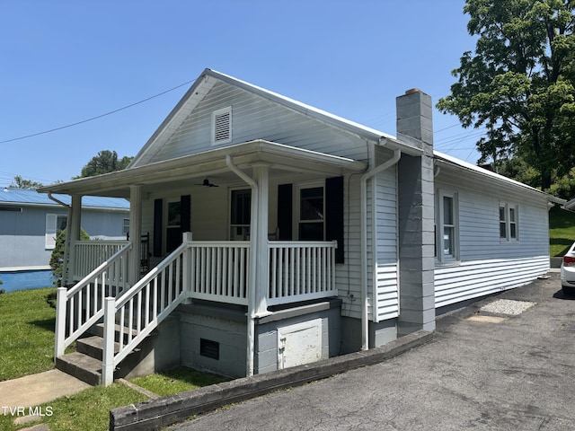 181 Powerhouse Holw, Clintwood, VA 24228 - view of front of property featuring covered porch and a chimney