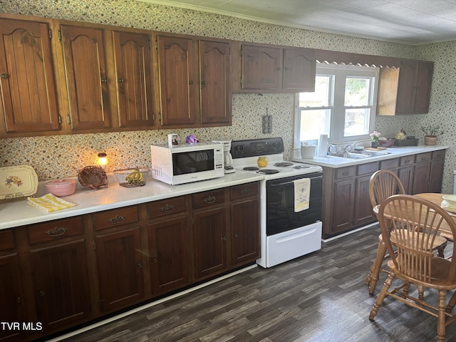 181 Powerhouse Holw, Clintwood, VA 24228 - kitchen with range with electric cooktop, white microwave, wallpapered walls, dark wood-style flooring, and a sink