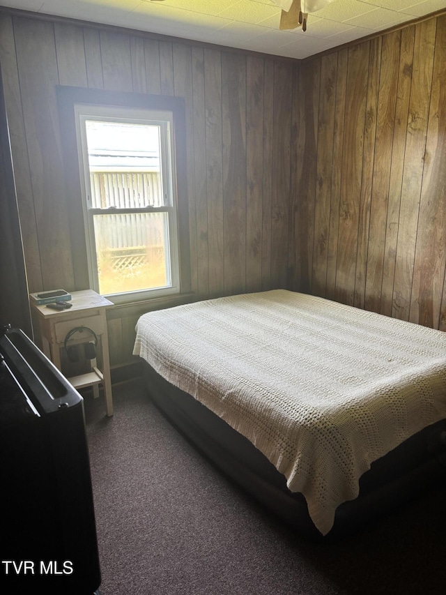 181 Powerhouse Holw, Clintwood, VA 24228 - carpeted bedroom with wood walls
