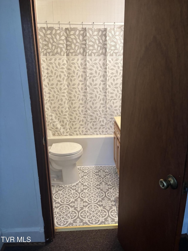 181 Powerhouse Holw, Clintwood, VA 24228 - bathroom featuring toilet, vanity, tile patterned flooring, and bathtub / shower combination