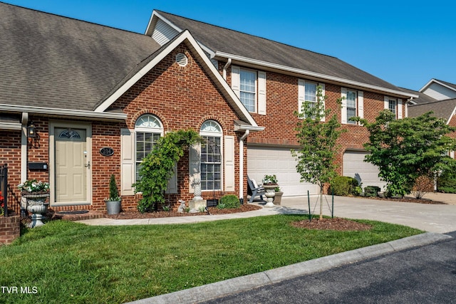 404 E Mountain View Rd Unit 204, Johnson City, TN 37601 - multi unit property featuring brick siding, driveway, a garage, and a front lawn