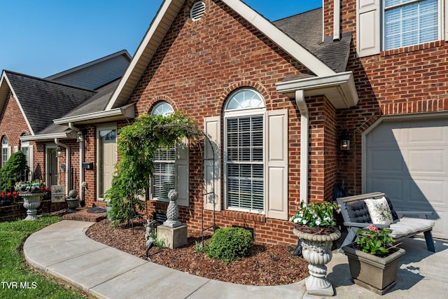 404 E Mountain View Rd Unit 204, Johnson City, TN 37601 - property entrance featuring brick siding and roof with shingles