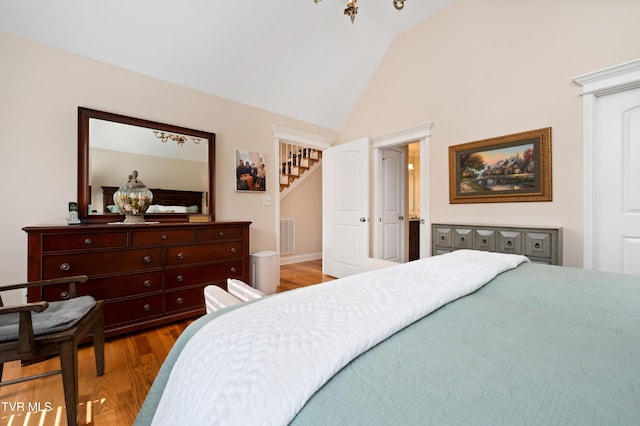 404 E Mountain View Rd Unit 204, Johnson City, TN 37601 - bedroom featuring wood finished floors and high vaulted ceiling