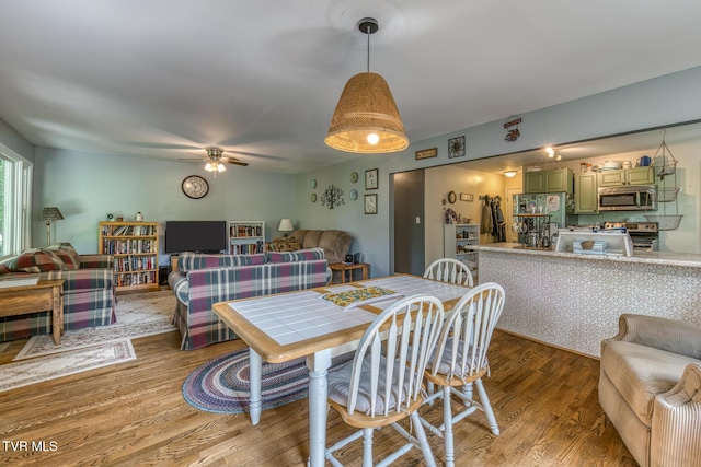 240 Watson Rd, Bristol, TN 37620 - dining space featuring wood finished floors and a ceiling fan