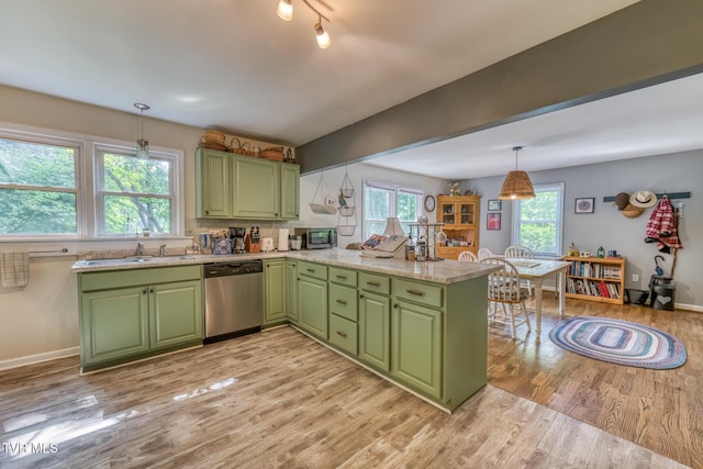 240 Watson Rd, Bristol, TN 37620 - kitchen featuring green cabinetry, stainless steel appliances, a sink, and light wood-style floors