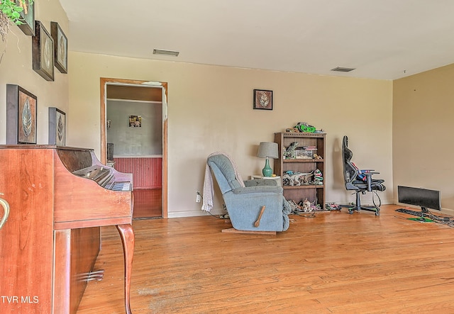 509 9th St, Erwin, TN 37650 - sitting room featuring wood finished floors and baseboards