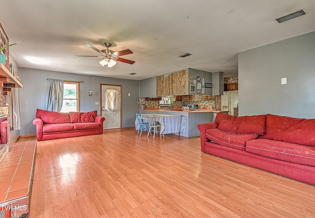 509 9th St, Erwin, TN 37650 - living area featuring ceiling fan and light wood finished floors