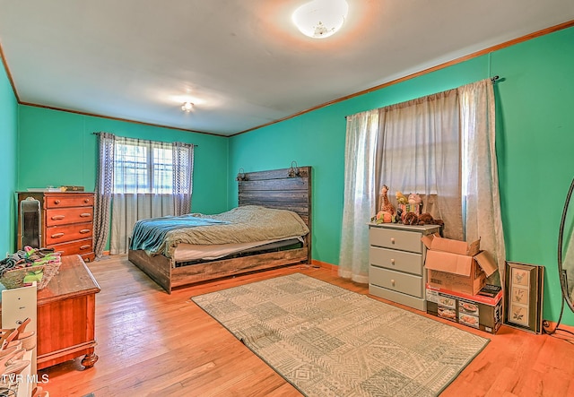 509 9th St, Erwin, TN 37650 - bedroom featuring wood finished floors, ornamental molding, and baseboards